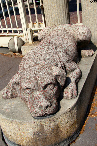 Sculpted dog guarding gates at Mobilier National workshops. Paris, France.