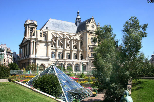Flying buttresses of St Eustache over gardens of Les Halles. Paris, France.