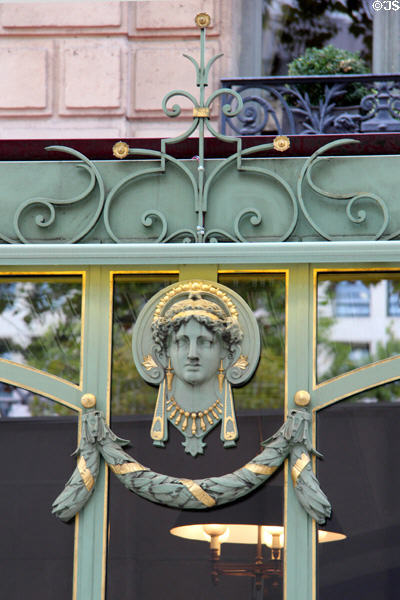 Detail of Art Nouveau restaurant building on Champs Elysees. Paris, France.
