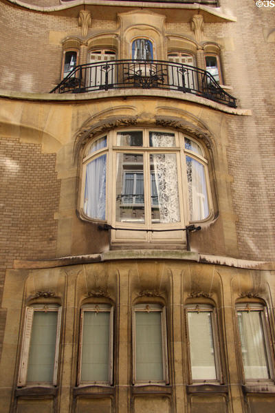 Art Nouveau facade details at Hôtel Guimard (1909-12) (122 ave. Mozart). Paris, France. Architect: Hector Guimard.