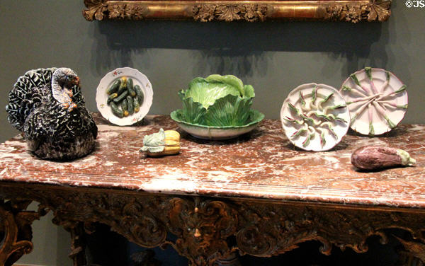 Ceramics made to mimic turkey, pickles, lettuce, radishes, eggplant mostly (1700s) from Paul Hannong of Strasbourg & P. Mombaers of Brussels at Museum of Decorative Arts. Paris, France.