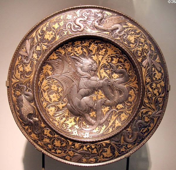 Embossed plate with chimera fighting snake (1878) by Elkington Co. of Birmingham (shown Paris Expo 1878) at Museum of Decorative Arts. Paris, France.