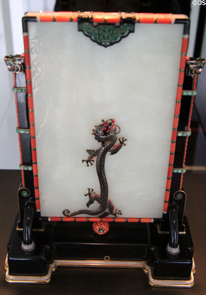 Dragon on back of Oriental-style jade table clock (1927) by jeweller Louis Cartier from Paris at Museum of Decorative Arts. Paris, France.