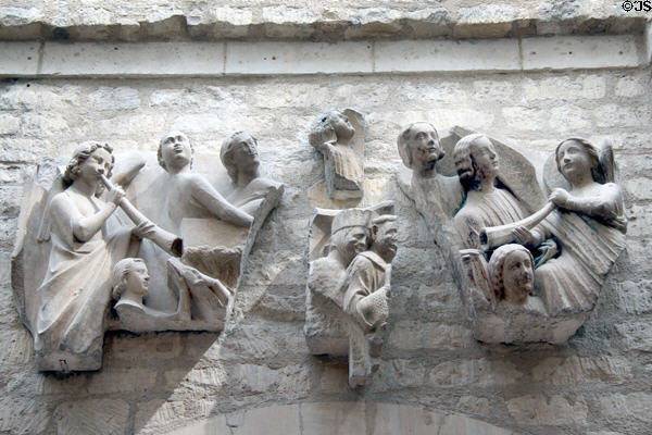 Stone fragments carved with last judgment scenes (1210-20) found at Notre Dame of Paris at Cluny Museum. Paris, France.