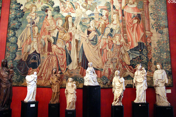 Triumph & Death of Honor tapestry (early 16thC) from southern Low Countries over religious carvings at Cluny Museum. Paris, France.