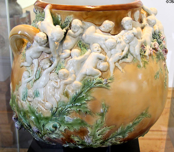 Ceramic combat vase (c1894-5) by Auguste Rodin & Albert-Ernest Carrier-Belleuse for Faïencerie de Choisy-le-Roi at Petit Palace Museum. Paris, France.