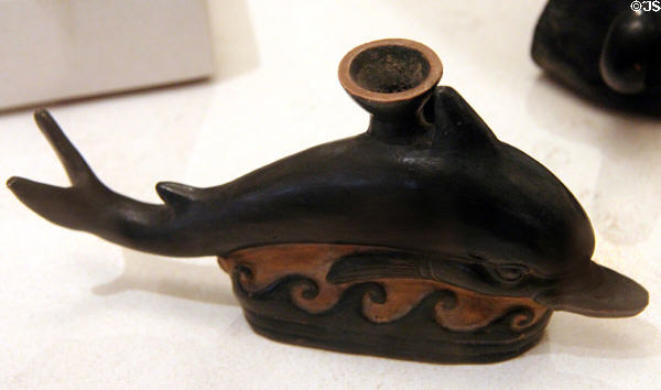 Vase in form of dolphin (c350-330 BCE) from Apulia, Italy at Petit Palace Museum. Paris, France.