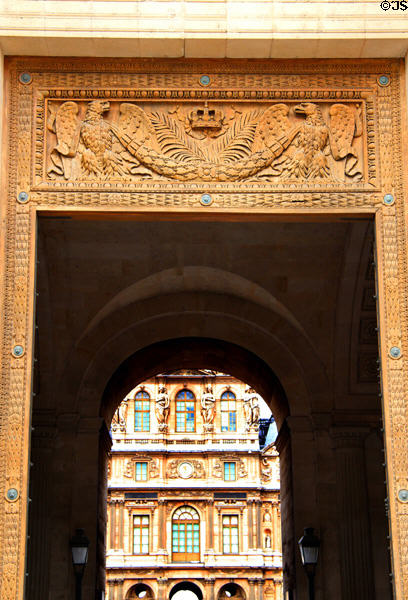 Passageway from Colonnade exterior to square courtyard (cour carrée) at Louvre Palace. Paris, France.