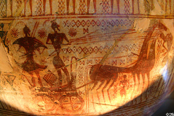 Athenian terracotta crater fragment with painted horses & chariot (c750 BCE) by master of Dipylon at Louvre Museum. Paris, France.
