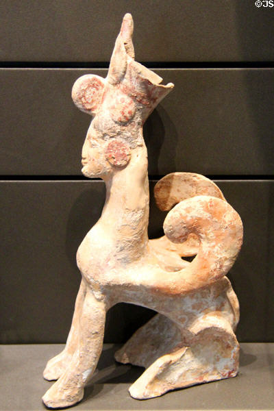 Greek terracotta sphinx (c550-525 BCE) made in Boeotia at Louvre Museum. Paris, France.