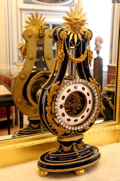 Bronze & Sèvres blue porcelain mantle clock in shape of lyre (18thC) attrib. Pierre Gouthière at Cognacq-Jay Museum. Paris, France.