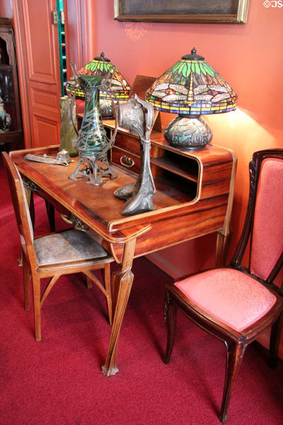 Desk with leaning legs at Maxim's Art Nouveau Collection 1900. Paris, France.