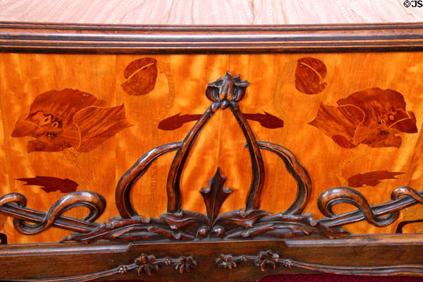Art Nouveau marquetry bedroom footboard at Maxim's Art Nouveau Collection 1900. Paris, France.