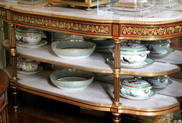 Sèvres Buffon porcelain serving dishes with birds (1784-6) on dining room sideboard at Nissim de Camondo Museum. Paris, France.