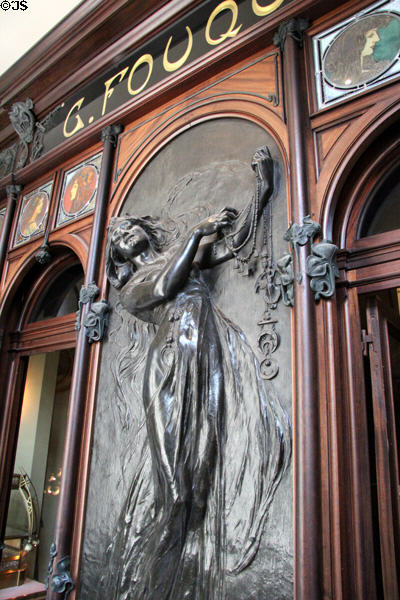 Art Nouveau figure (1901) designed by Alphonse Mucha on storefront of Boutique Fouquet at Carnavalet Museum. Paris, France.