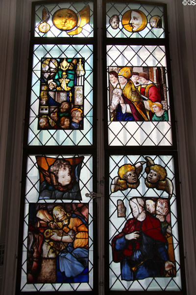Stained glass window with religious themes at Carnavalet Museum. Paris, France.
