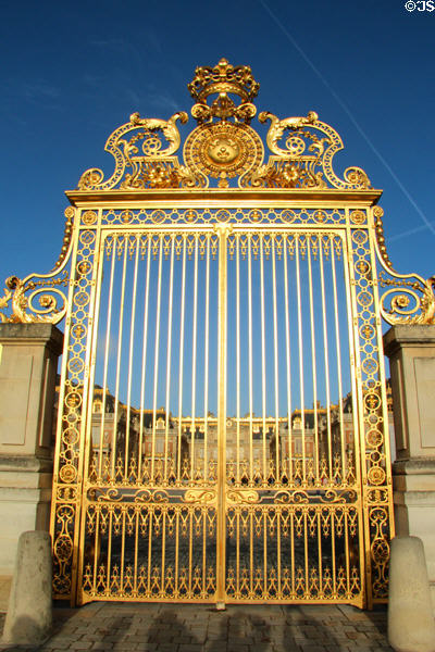 Royal Court gilded gates at Versailles Palace. Versailles, France.