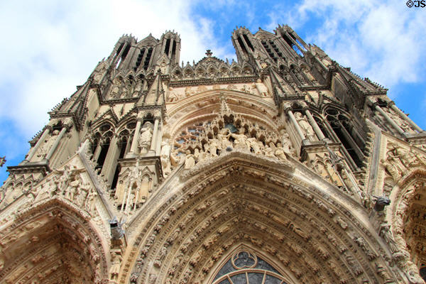Carvings under gabled portals of Reims Cathedral. Reims, France.