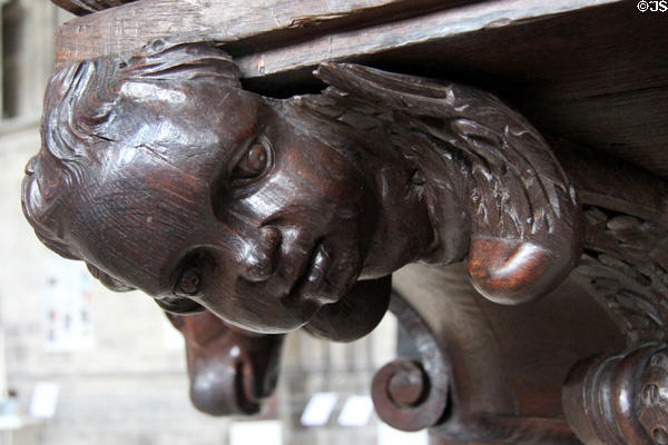 Carved angel representing Evangelist Matthew on pulpit in Reims Cathedral. Reims, France.