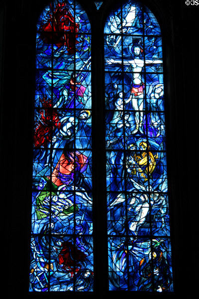 Christ Crucified over scenes of Abraham, Isaac & Jacob detail on Chagall stained glass window at Reims Cathedral. Reims, France.