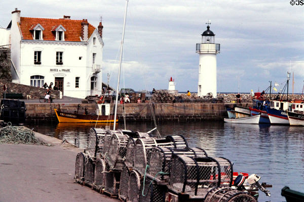 Historic Hôtel du Phare, lighthouse & lobster pots in Sauzon. Belle-Isle-en-Mer, France.