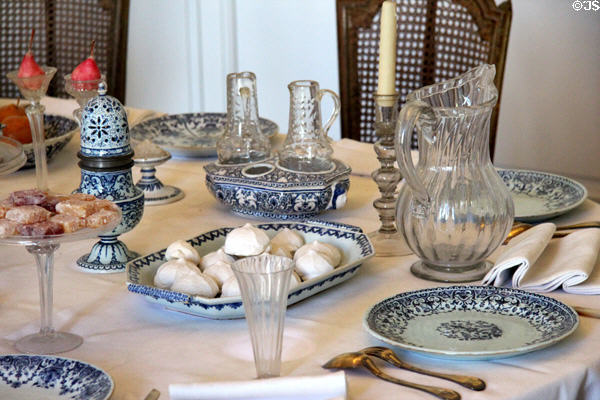 Rouen-made earthenware (18thC) & glass serving platter, cruet set, caster & pitcher at Rouen Ceramic Museum. Rouen, France.