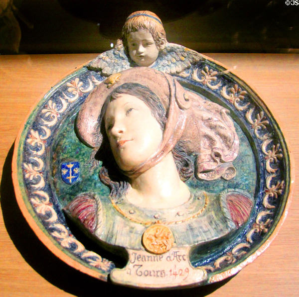 Joan of Arc stop in Tours in 1429 to obtain armor on plaster plate (1895) by Edouard Avisseau in Royal Lodgings museum at Château de Chinon. Chinon, France.