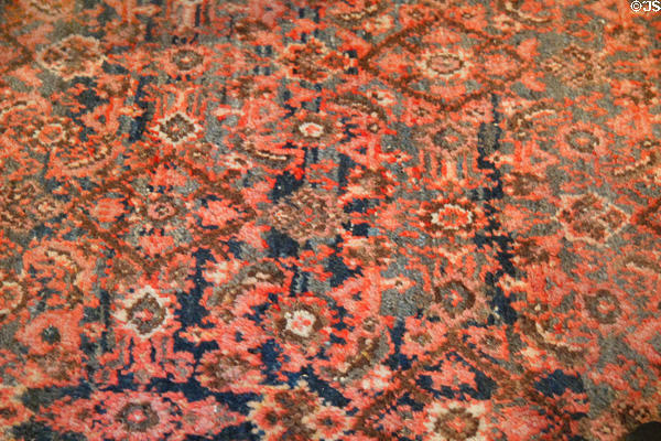 Pink & blue hand woven carpet in King's bedroom at Chateau D'Ussé. Ussé, France.