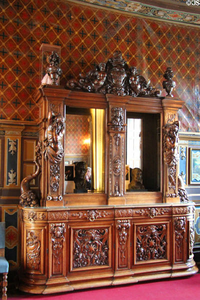 Carved dining room oak sideboard at Cheverny Chateau. Cheverny, France.