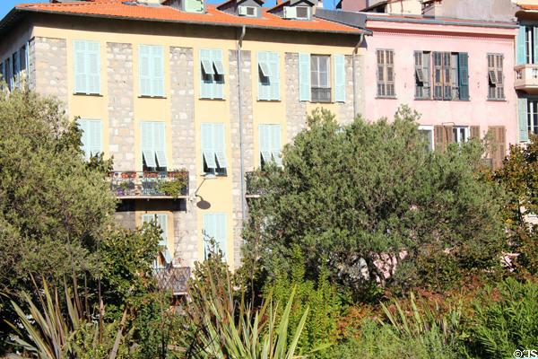 Apartment building framed by plantings in Promenade du Paillon. Nice, France.
