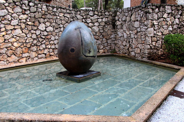 Miró ovoid sculpture & stone walls in Miró Labyrinth at Fondation Maeght. St Paul de Vence, France.
