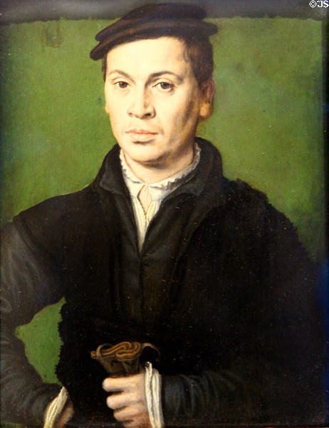 Portrait of a man with black beret holding gloves (c1535) by Corneille de Lyon at Beaux-Arts Museum. Lyon, France.