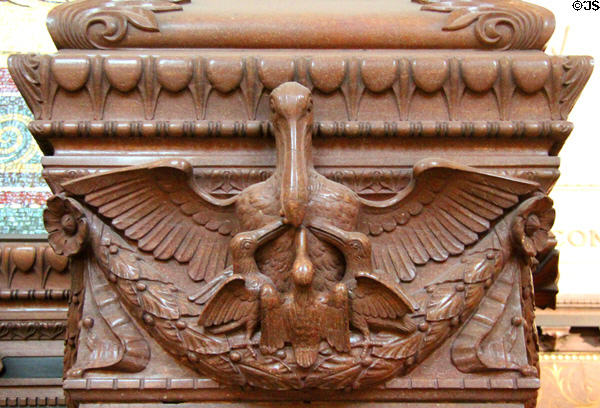Carving of pelican feeding young with own blood symbol of Christ's sacrifice at Basilique Notre-Dame de Fourvière. Lyon, France.