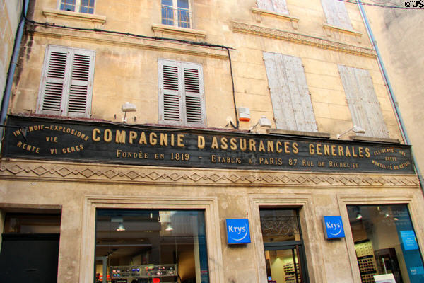 Antique sign for an insurance company. Arles, France.