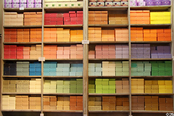 Olive oil soaps in shop at city hall square market. Aix-en-Provence, France.