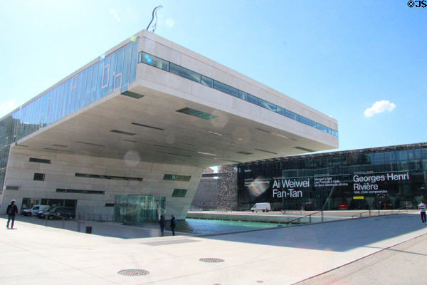 Cantilevered Villa Méditerranée exhibition building frames MuCEM museum. Marseille, France.