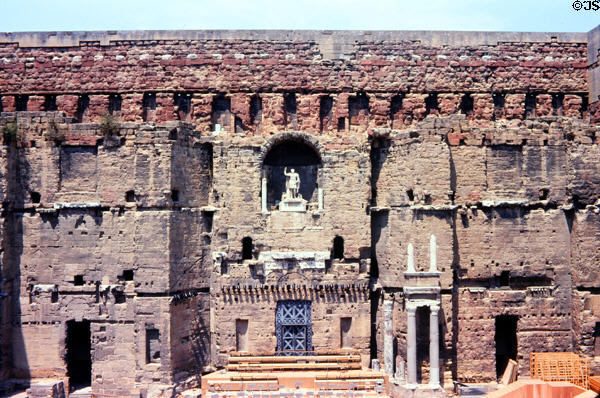 Wall behind Roman theater stage with statue of Caesar. Orange, France.