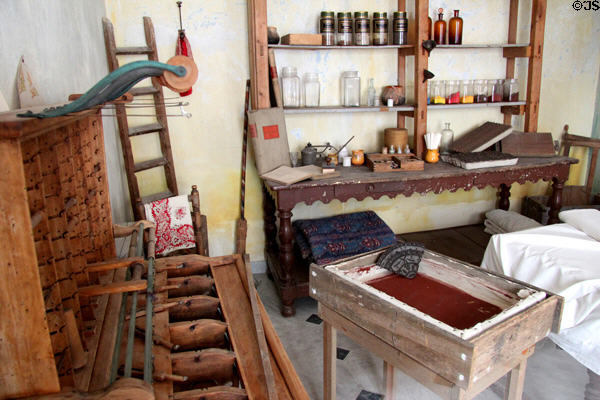 Recreation of cloth printing workshop with tools for block printing (c18thC) at Orange museum of art & history. Orange, France.
