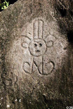 Native face with headdress & necklace at Parc Archeologique. Trois Rivières, Guadeloupe.