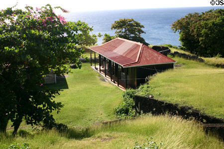 Ramparts of Vieux Fort now encloses a lace making center. Guadeloupe.