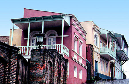Multicolored houses climb a hill in Tbilisi. Georgia.