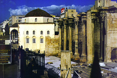 Old Mosque Ceramic Museum beyond the columns of Hadrian's Library in Plaka, Athens. Greece.