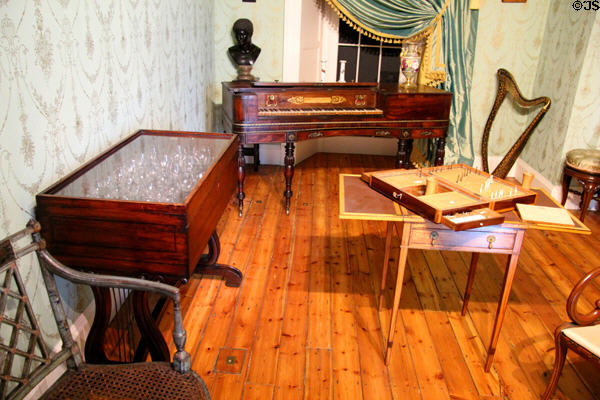 19th C Irish musical instruments including glass harmonica on left & harp on right at National Museum Decorative Arts & History. Dublin, Ireland.