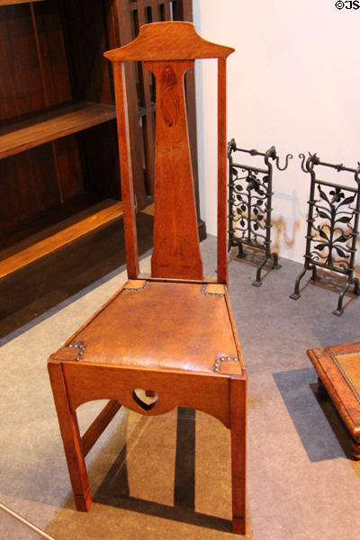 Art Nouveau oak hall chair (c1900) by Arthur Jones at National Museum Decorative Arts & History. Dublin, Ireland.