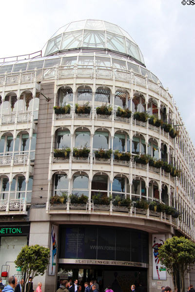 Round exterior corner of glasshouse facade of Stephen's Green Shopping Centre. Dublin, Ireland.