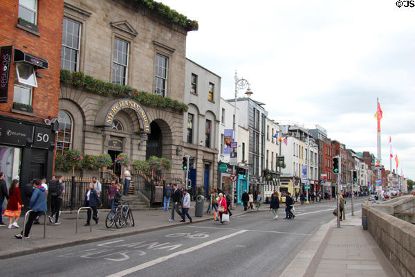 Riverfront buildings along River Liffey in Temple Bar with Merchant's Arch. Dublin, Ireland.