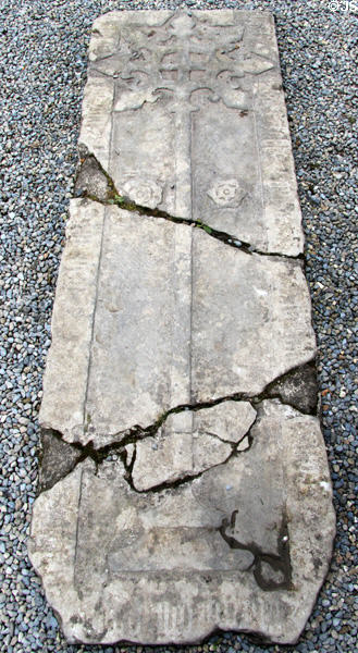 Tomb slab with cross in cathedral at Rock of Cashel. Cashel, Ireland.