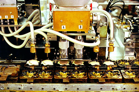 Cookie-making machine in Miya Jima. Japan.