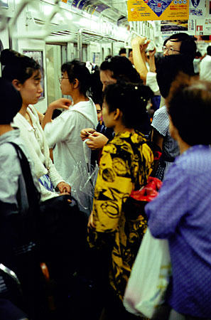 Subway with woman in Yukata in Kyoto. Japan.