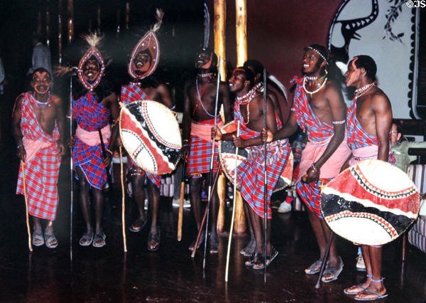 Masai dancers in traditional dress in Amboseli National Park. Kenya.
